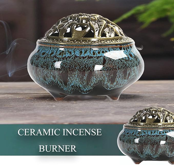 Ceramic incense burner with blue glaze and gold accents on a wooden surface.